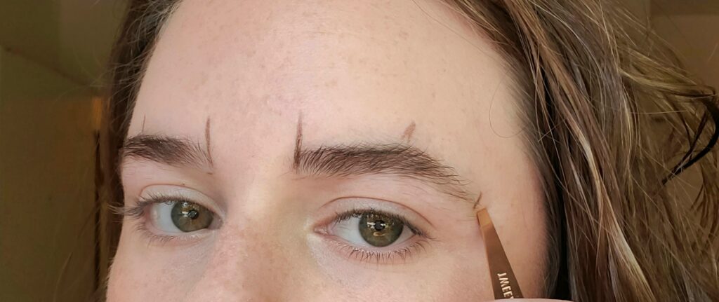 Tweezing tail of brow, brow shaping guide